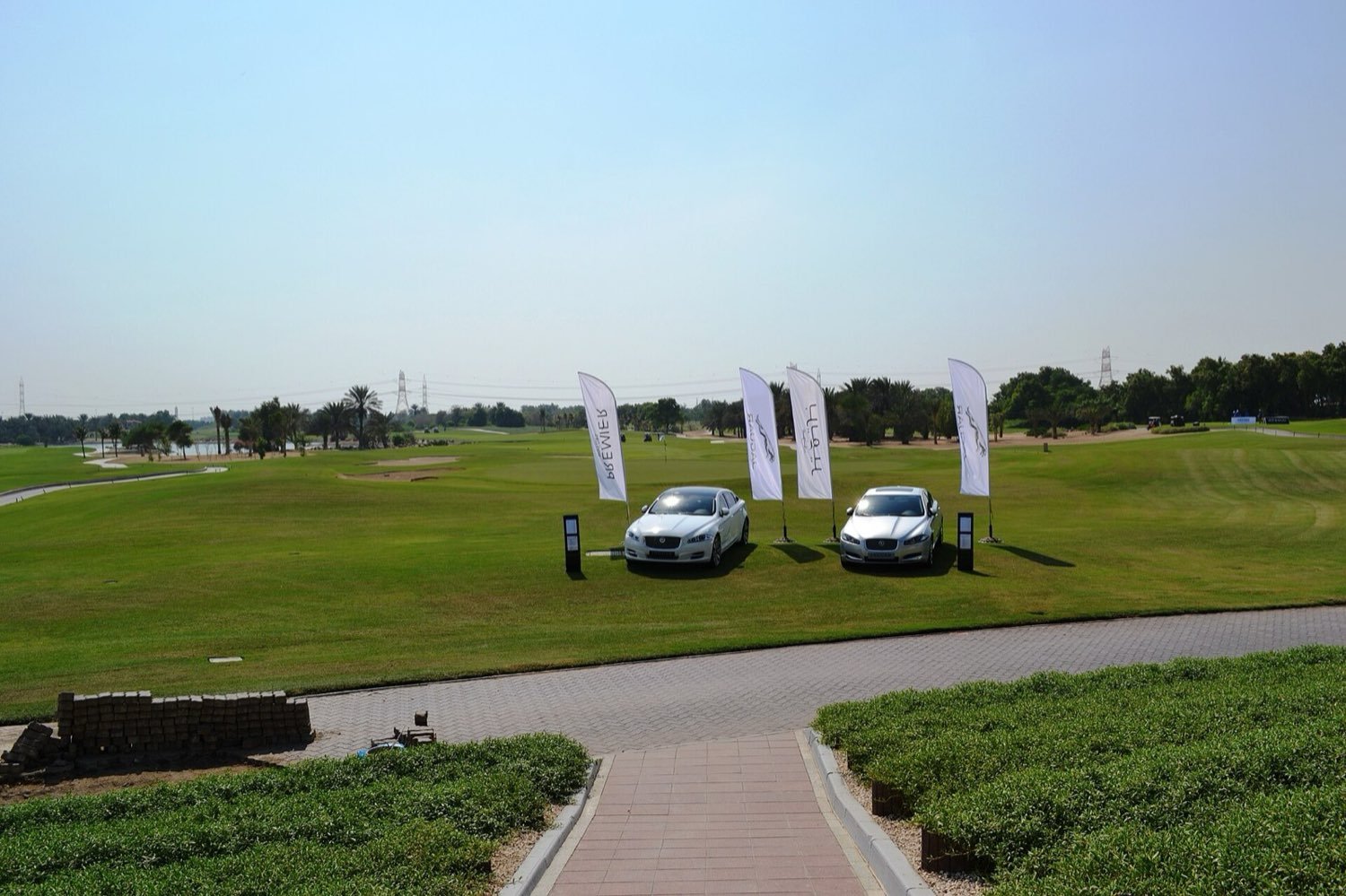 Cars displayed by the Abu Dhabi distributor Premier Motors at a golf event in the emirate